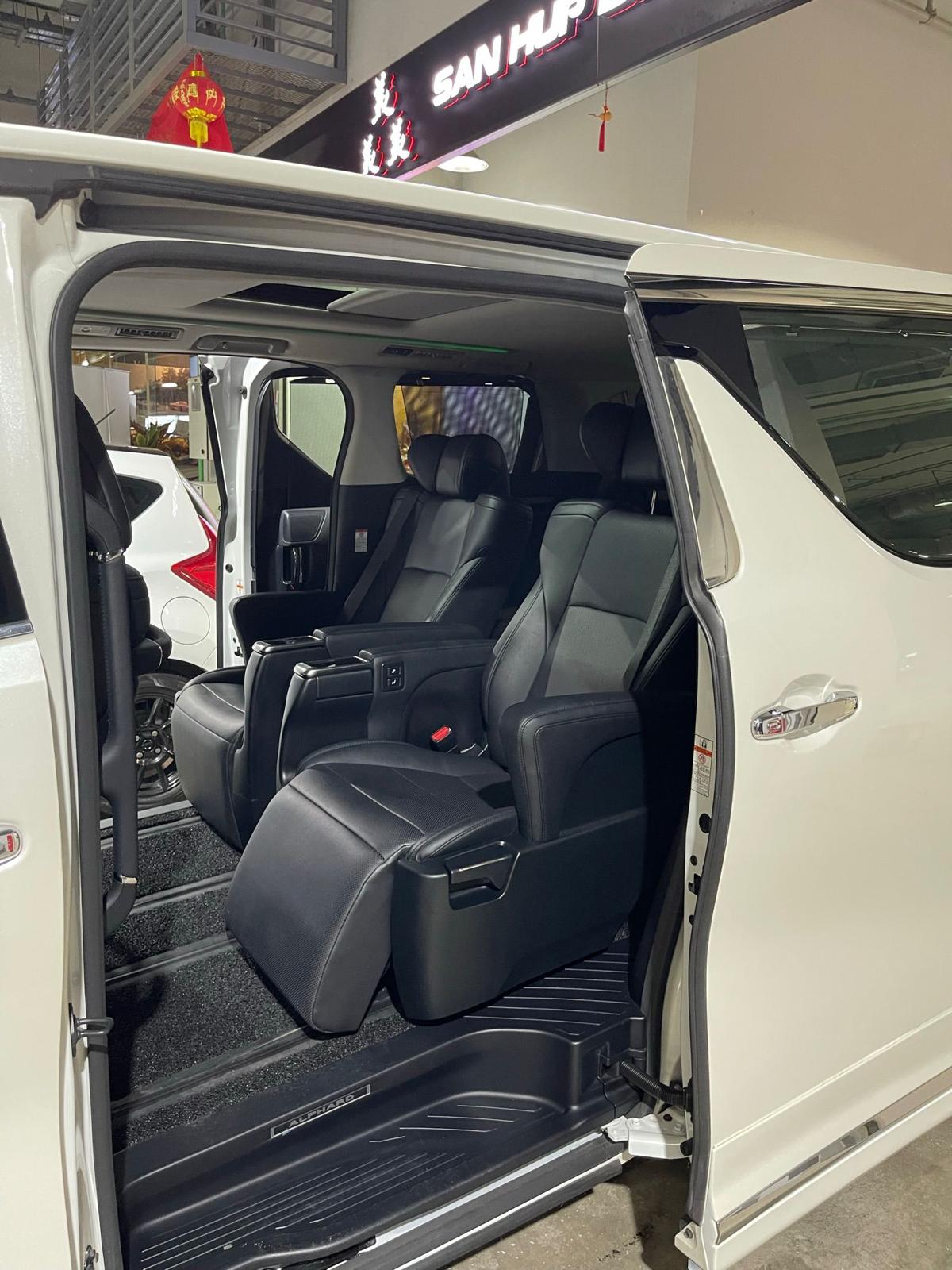 Toyota Alphard VIP limo with sliding door open