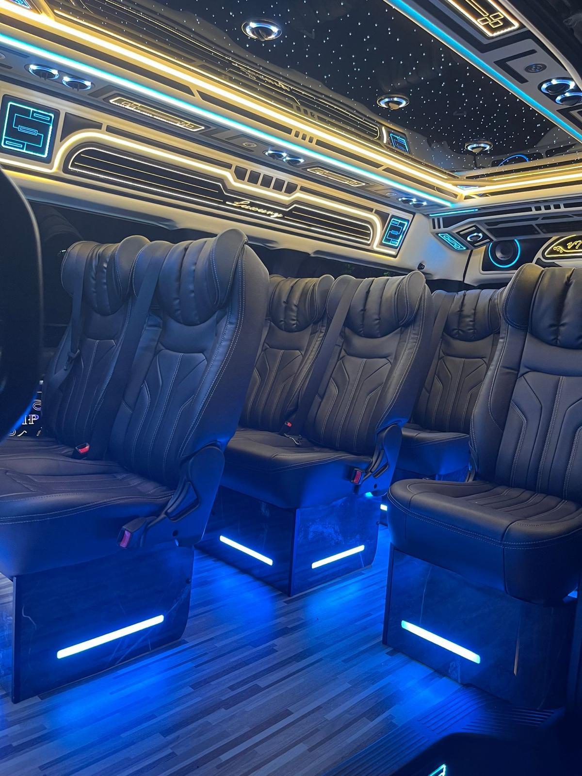 VIP luxury van with neon starlight ceiling and premium leather seats